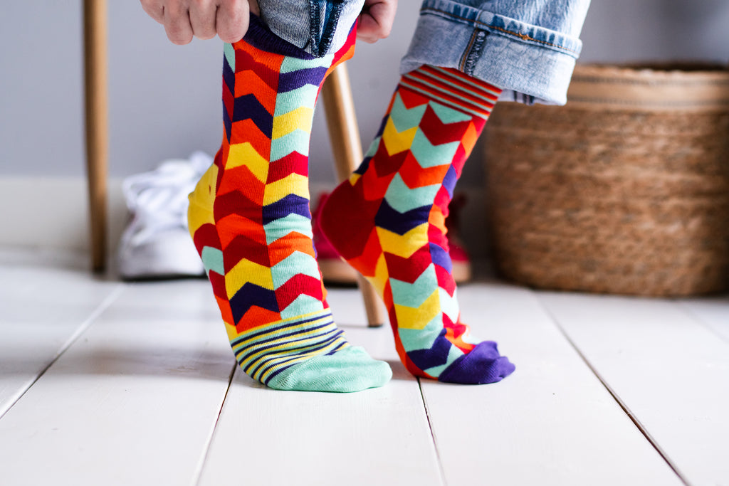 Women’s mismatched chevron socks supporting the Canadian Down Syndrome Society – stylish and meaningful.