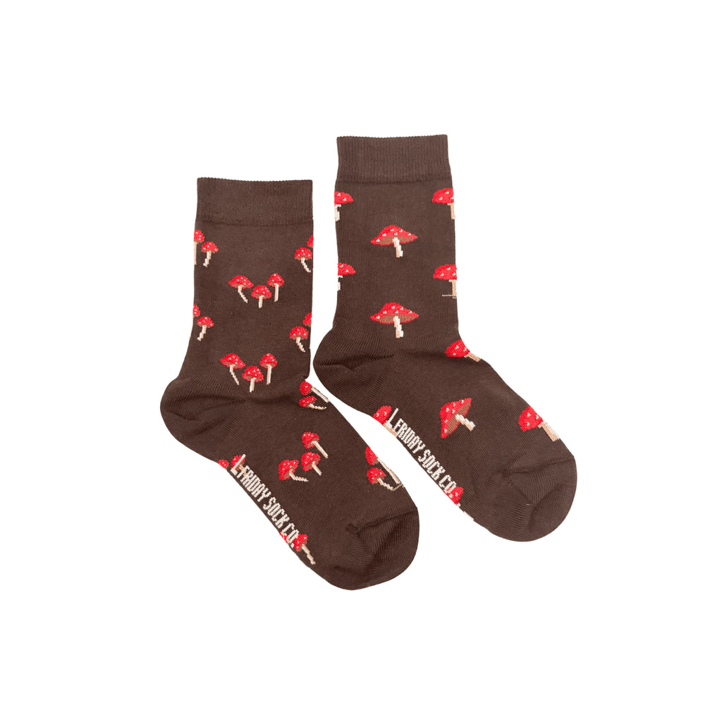 Playful kids’ socks featuring fun mismatched mushroom designs – cozy and full of forest charm.