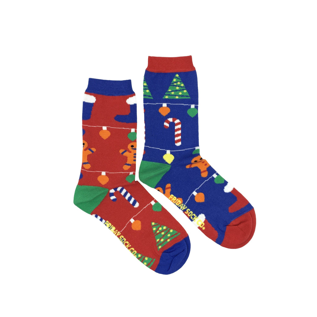 blue and red festive Christmas socks with gingerbread cookies, candycanes and Christmas trees